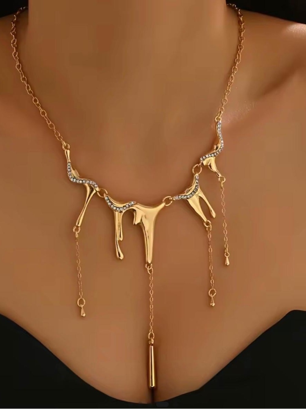 Gold Drip Statement Necklace with Rhinestone Accents Abstract Melt Design
